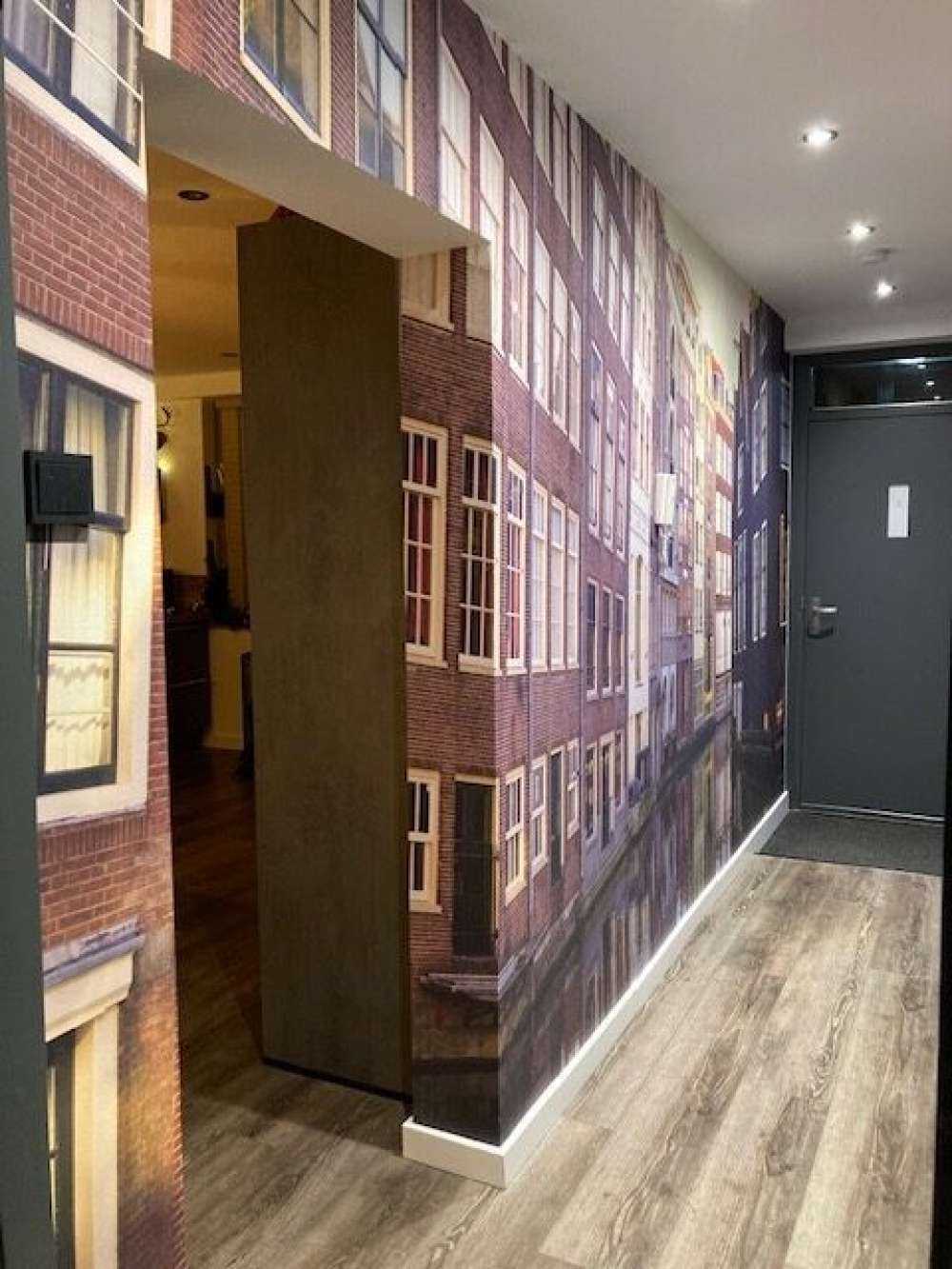 Les maisons d'Amsterdam sur le canal