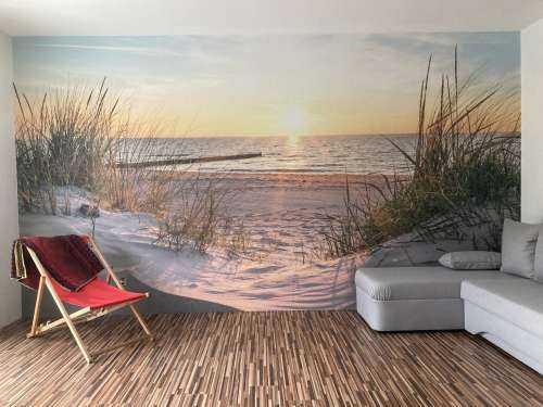 Plage de dunes avec coucher de soleil