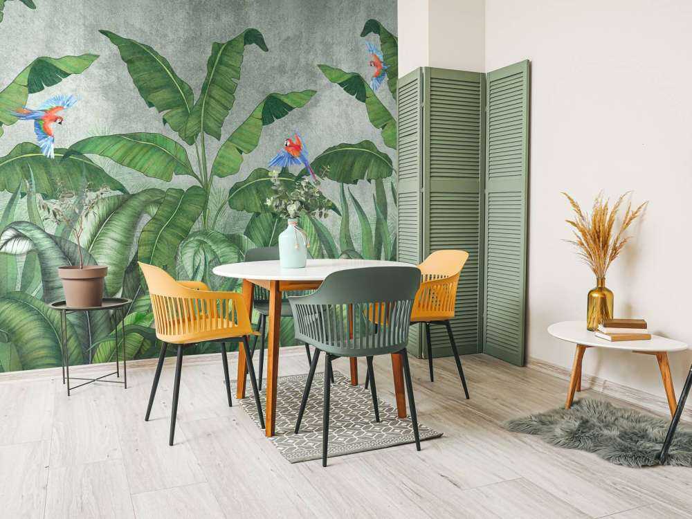 Feuilles tropicales sur du béton