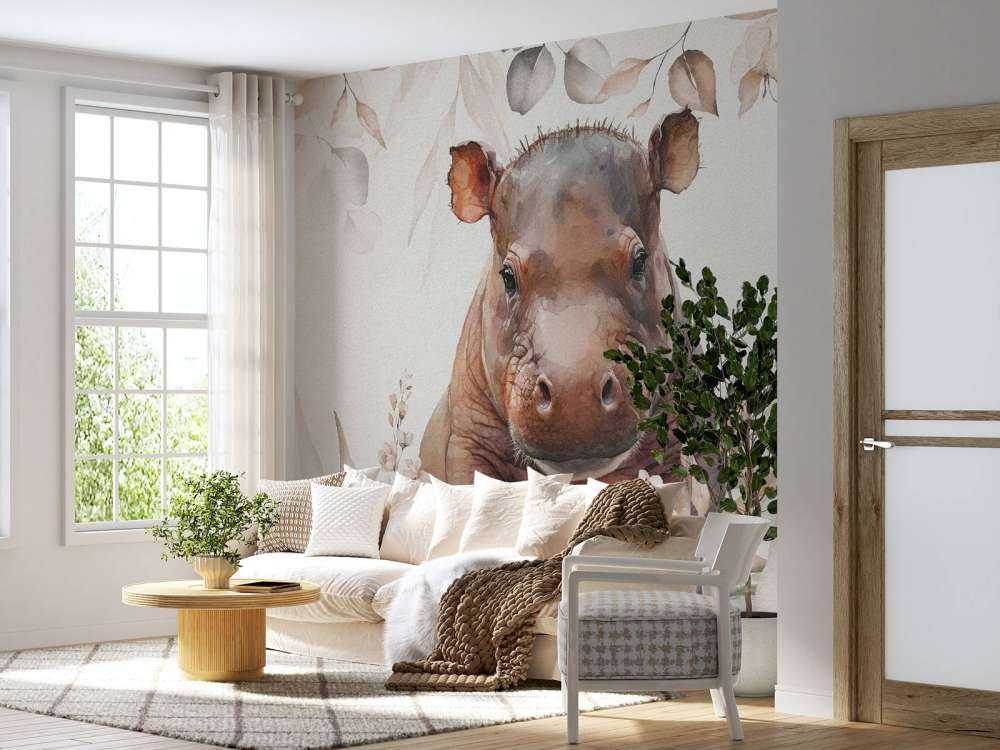 Bébé hippopotame dans les feuilles taupe