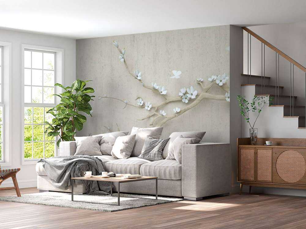 Branche avec fleurs blanches sur un fond en bois