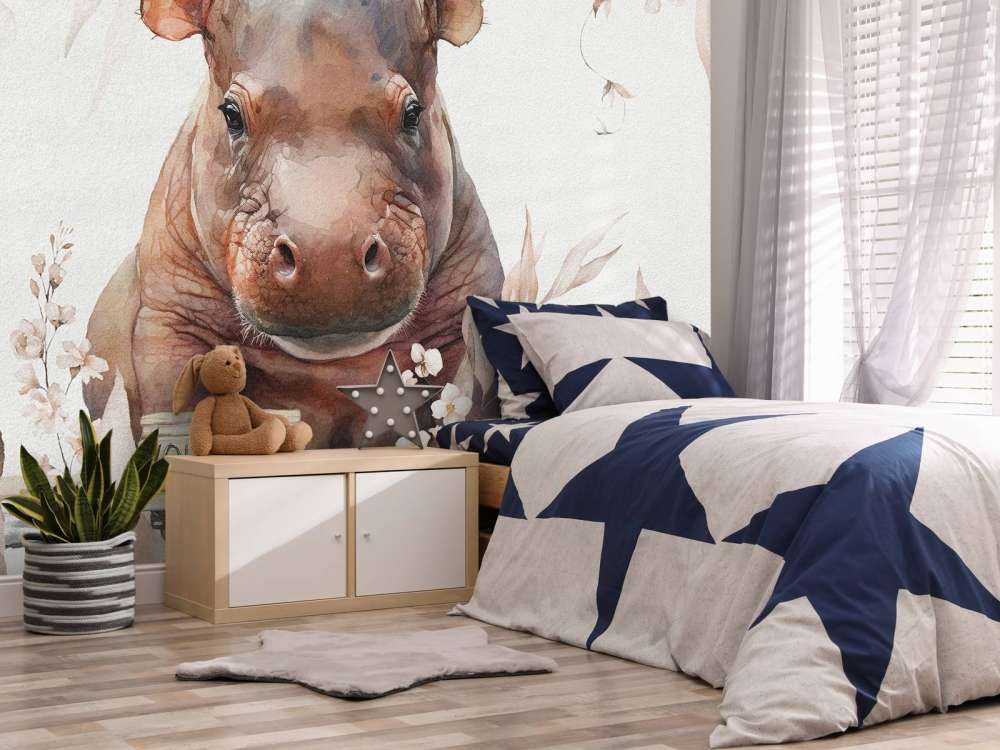 Bébé hippopotame dans les feuilles taupe