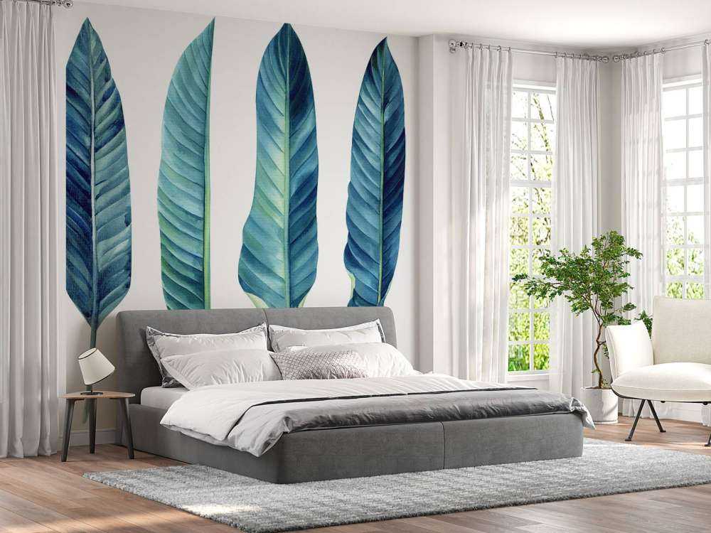 Feuilles tropicales bleu canard sur fond blanc