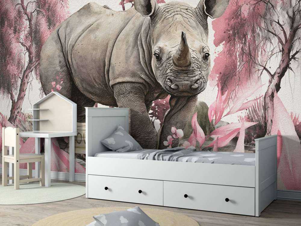 Bébé rhino dans la savane rose