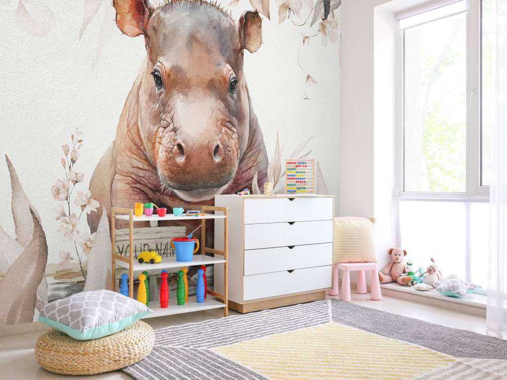 Bébé hippopotame dans les feuilles taupe
