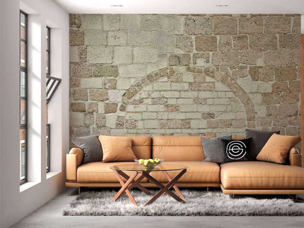 Vieux mur de pierre avec arc