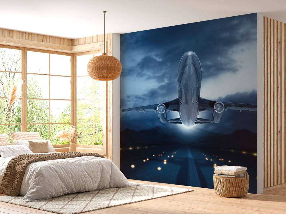 Un avion qui s'élève avec un ciel sombre