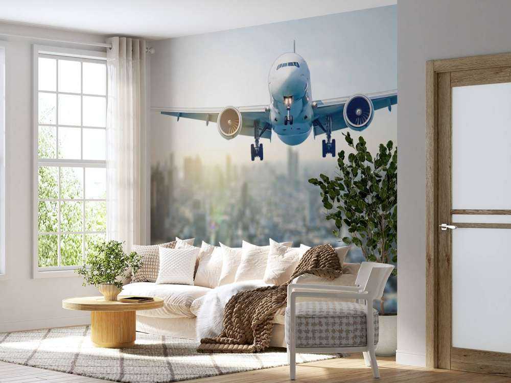 Descente d'un avion au-dessus d'une ville