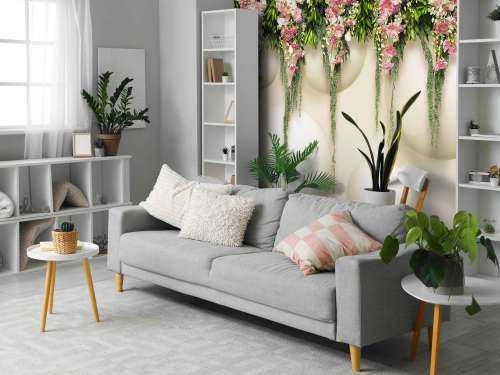 Fleurs roses suspendues sur un mur en 3D