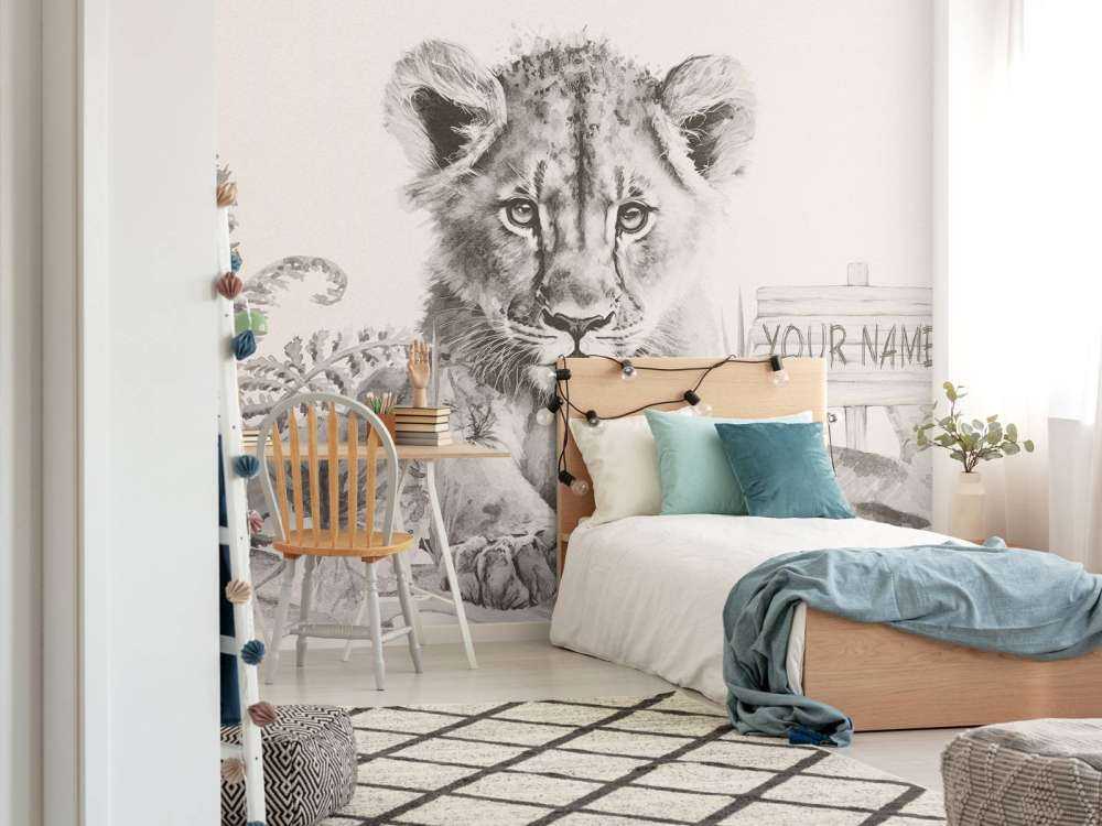 Bébé lion dans la jungle beige