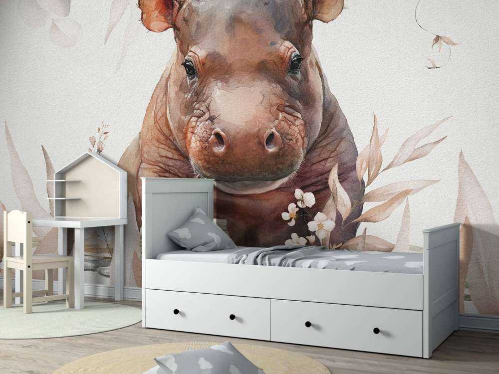 Bébé hippopotame dans les feuilles taupe