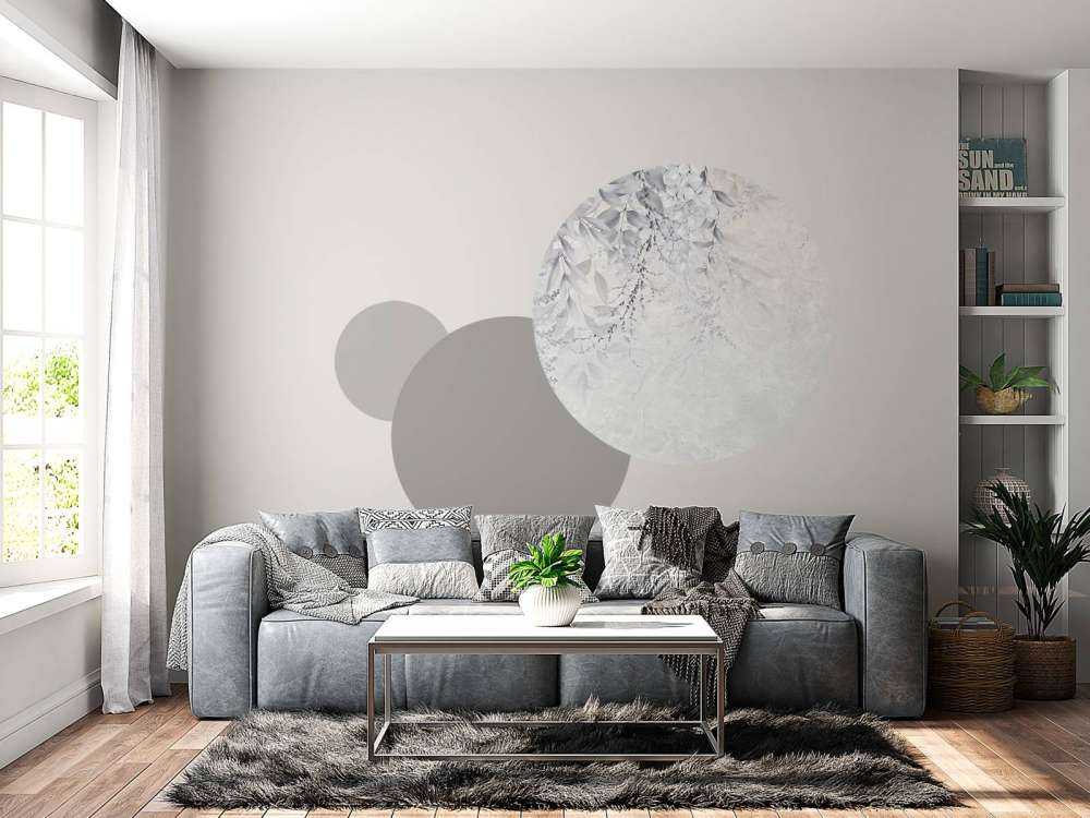 Feuilles sur un mur de marbre