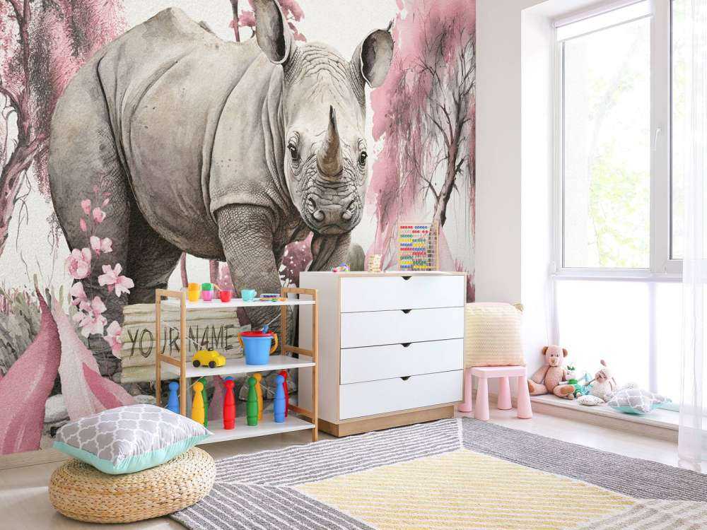 Bébé rhino dans la savane rose
