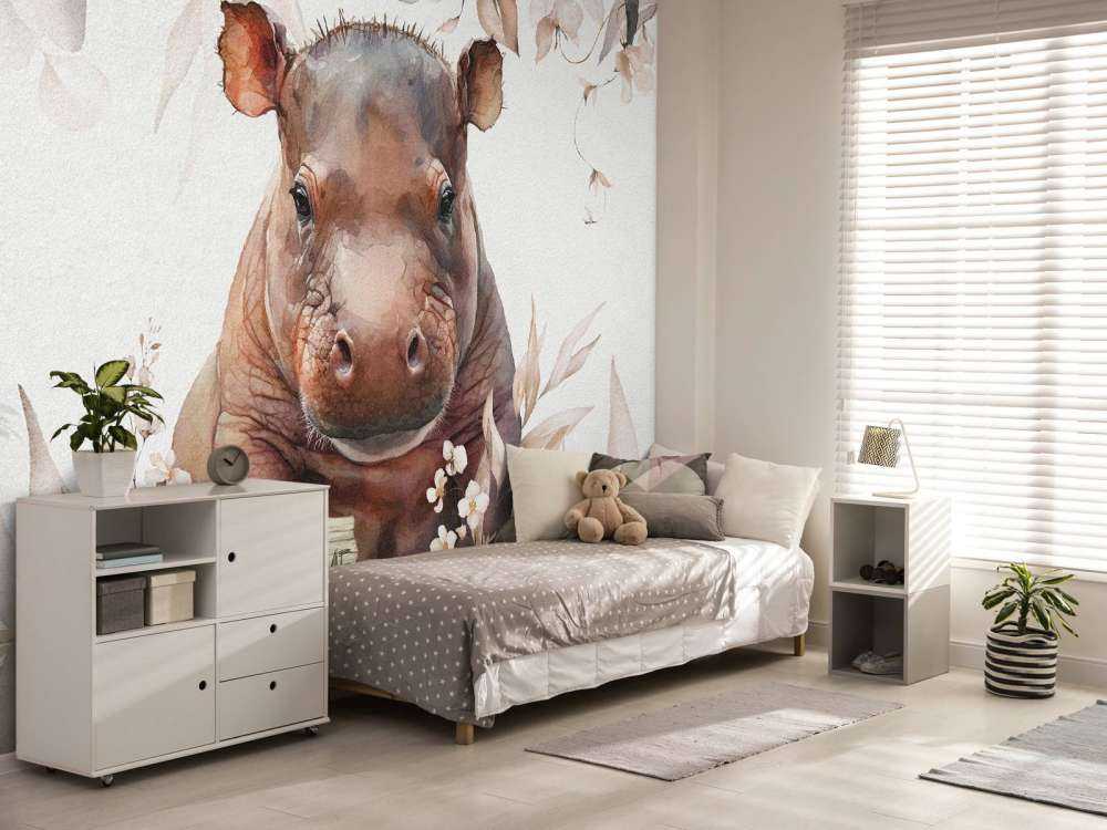 Bébé hippopotame dans les feuilles taupe