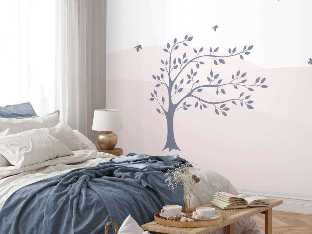 Des collines roses avec un arbre
